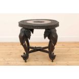 A carved rosewood centre table,