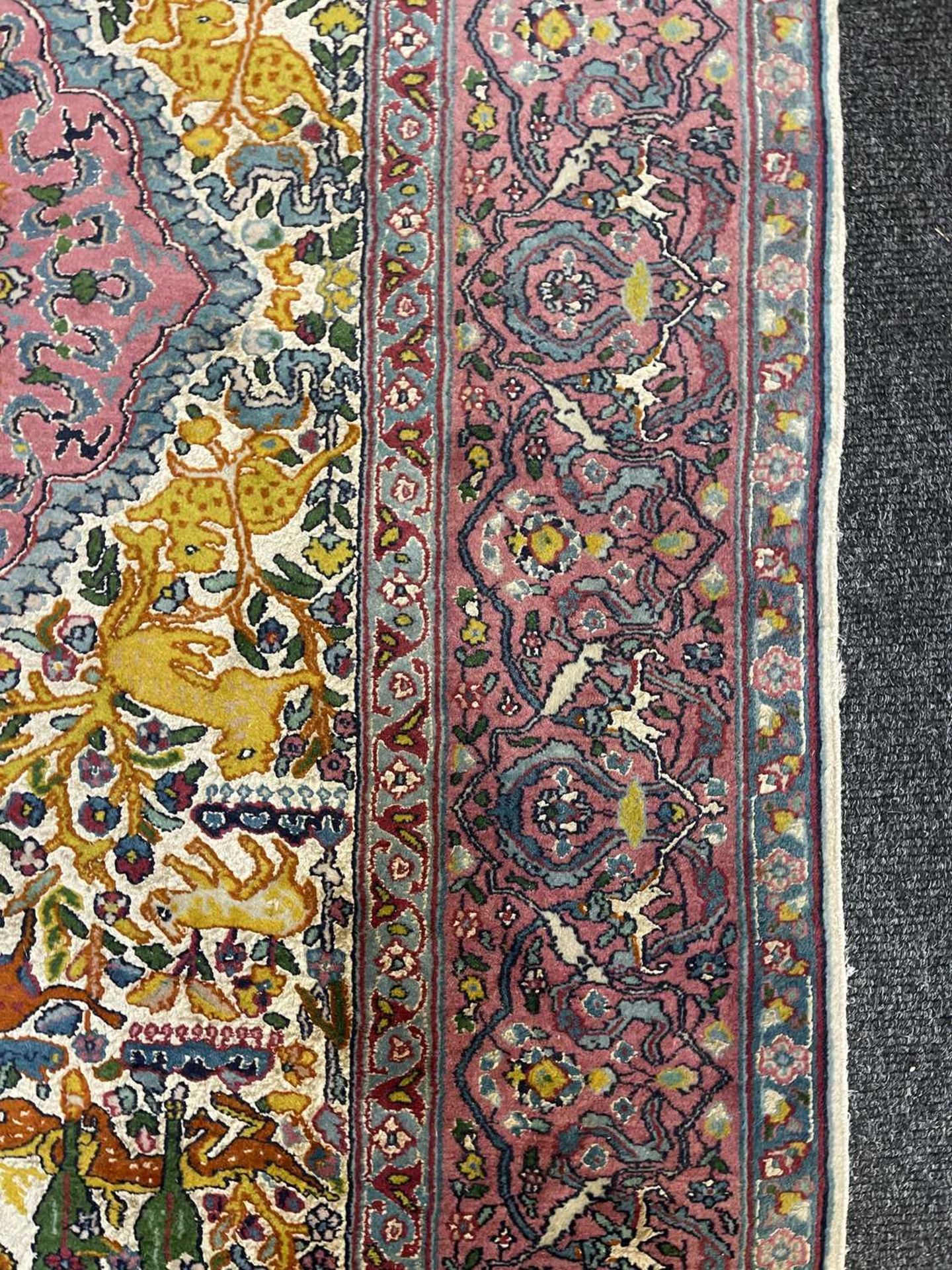 A Persian wool rug with silk highlights, - Bild 8 aus 22