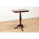 A rosewood tripod table in the manner of Gillows,