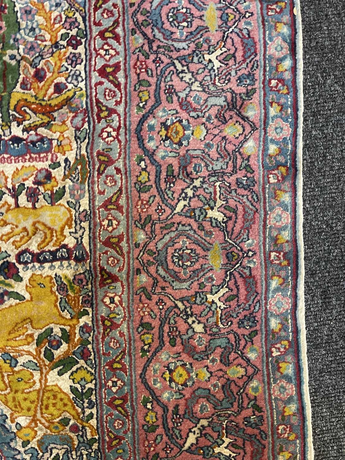 A Persian wool rug with silk highlights, - Bild 7 aus 22