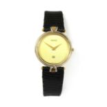 A gold plated Gucci quartz strap watch,