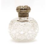 A William Commyns silver topped cut glass perfume bottle