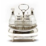 A George III silver cruet set,