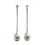 A pair of cast and silvered novelty golf iron and ball candlesticks,