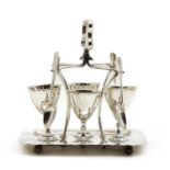 A silver egg cruet stand,