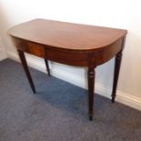 An early 19th century mahogany and boxwood-strung demi-lune side table (formerly a tea table now