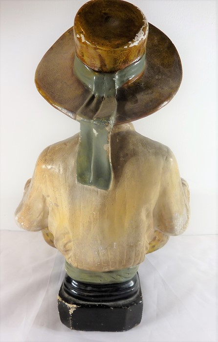 A mid-20th century painted plaster blackamoor-style figure; the smiling figure holds a two-handled - Image 3 of 3