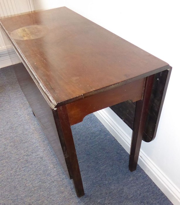 A late 18th century drop-leaf mahogany dining table on square chamfered legs - Image 2 of 2