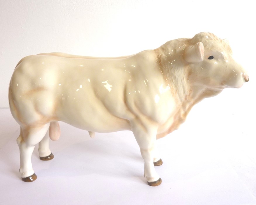 A large John Beswick model of a bullock; signed to underside (23.5cm long) - Image 2 of 4