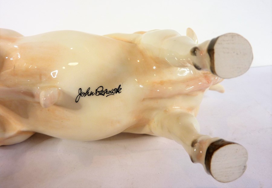 A large John Beswick model of a bullock; signed to underside (23.5cm long) - Image 4 of 4