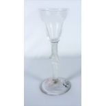 A circa 1760 pan top air-twist wine glass (approx. 16cm high)  Condition Report: Good overall