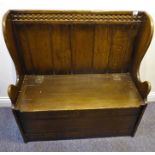 A Titchmarsh & Goodwin oak box settle