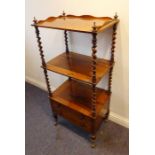 A mid-19th century three-tier rosewood whatnot; the three-quarter galleried top above barley-twist-