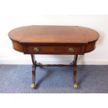 A good quality Regency-style mahogany, cross-banded and boxwood-strung centre library table;