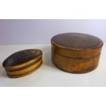 Two 19th century snuff boxes (the oval horn pocket box 5.4cm, and the circular fruitwood table snuff