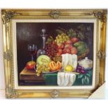 L SUTTON; a gilt-framed oil on artist's board still-life study of a decanter, wine glass and various