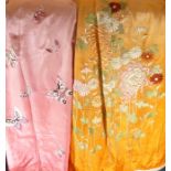 Two fine, hand-stitched Japanese kimonos decorated with flowers and butterfliesSome staining