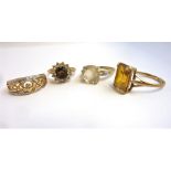 Four 9-carat gold stone-set rings (13.6g) (The cost of UK postage via Royal Mail Special Delivery