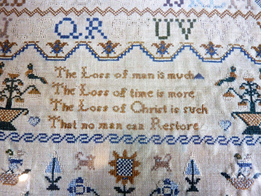 A George IV (dated 1820) framed and glazed (later) needlework sampler; intricately sewn with - Image 2 of 3