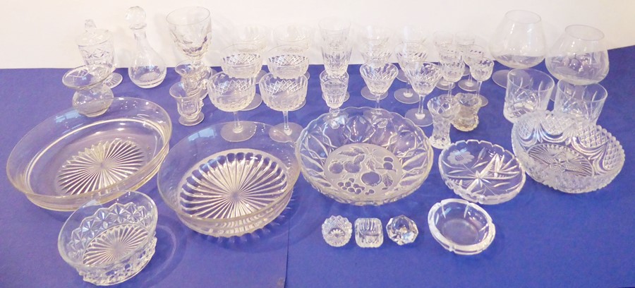 A quantity of good cut glassware; to include a set of six champagnes, wines and liqueurs, five bowls