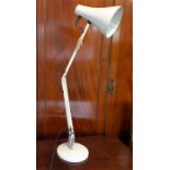 A cream Anglepoise lamp