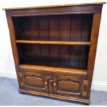 A Titchmarsh & Goodwin oak bookcaseCouple of minor scratches on the fielded panels which would