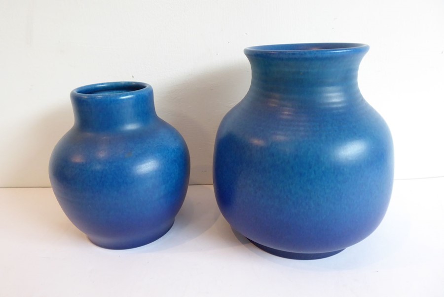 Two Royal Lancastrian electric-blue porcelain vases (19cm and 15cm high)