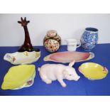 A good selection of pottery and porcelain: a model of a pig and a model of a giraffe (the larger,