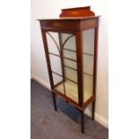 A good Edwardian mahogany and boxwood-strung display cabinet; of slim and pleasing proportion, the