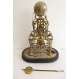 A single fusee skeleton clock; striking on a bell and for full restoration, mounted on an oval