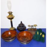 A mixed lot comprising an early 20th century set of brass postal scales with weights, an oil lamp (