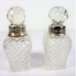 A pair of cut-glass silver-mounted scents Condition Report: The first scent - the silver mount on