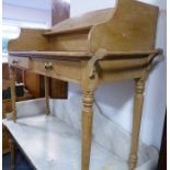 A late 19th century pine washstand comprising three-course galleried top above two half-width