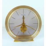 A designer Lucite/plastic mantle clock; the dial signed 'Jaeger-LeCoultre' (overwound and requires