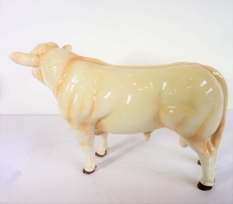 A large John Beswick model of a bullock; signed to underside (23.5cm long) - Image 3 of 4