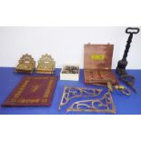 Assorted metalware to include a pair of late 19th century ornate brackets , a cast-iron door stop