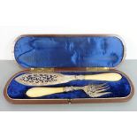 A fine 19th century walnut-cased, hallmarked silver and ivory-handled fish-slice and fork set,