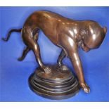 A large figure of a big cat in patinated bronze (43cm from tail to front paw and 27cm high)