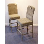 A modern pair of wickerwork conservatory-style chairs