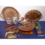 A selection of artefacts from Papua New Guinea; to include three hand-woven wickerwork baskets,