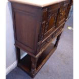 A Titchmarsh & Goodwin oak wine cabinet with slidesVery good condition; deliberately aged; high