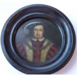 A late 18th to early 19th century circular oil on panel shoulder-length portrait miniature of