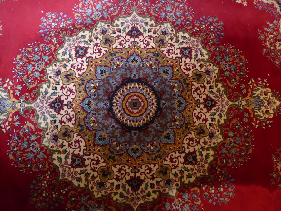 A large and fine Persian-style carpet; the central multi-coloured mon with Moorish-style palmettes - Image 3 of 4