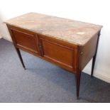 An Edwardian marble-topped mahogany washstand having two panelled doors (108cm wide)