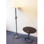 A modern designer lamp standard with a wrythen middle;  together with a matching circular side table