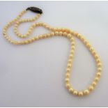 A single-strand graduated cultured pearl necklace (The cost of UK postage via Royal Mail Special