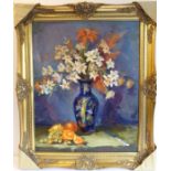 L SUTTON; a gilt-framed oil on artist's board still-life study of flowers in a vase and fruits,