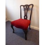 An 18th century style gentleman's mahogany salon chair of large and comfortable proportions (