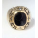 An onyx and two brilliant-cut diamond-set college-style ring (size S) (gross weight 16.72g) (The