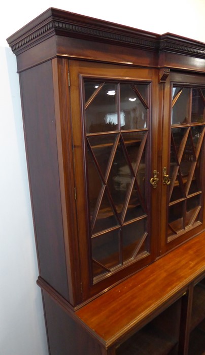 An early 20th century walnut display cabinet/bookcase; the breakfront dentil cornice above three - Image 4 of 9